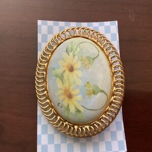 Vintage hand painted yellow flower on porcelain brooch gold tone blue and yellow